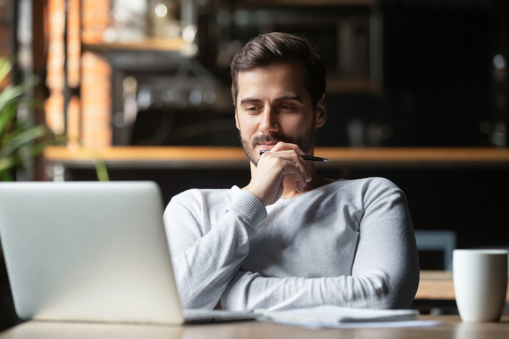 Businessman Looking At Laptop